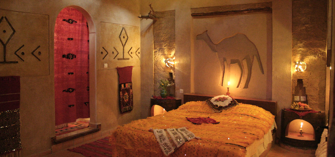 Bedroom in Auberge Café du Sud decorated in traditional Moroccan style